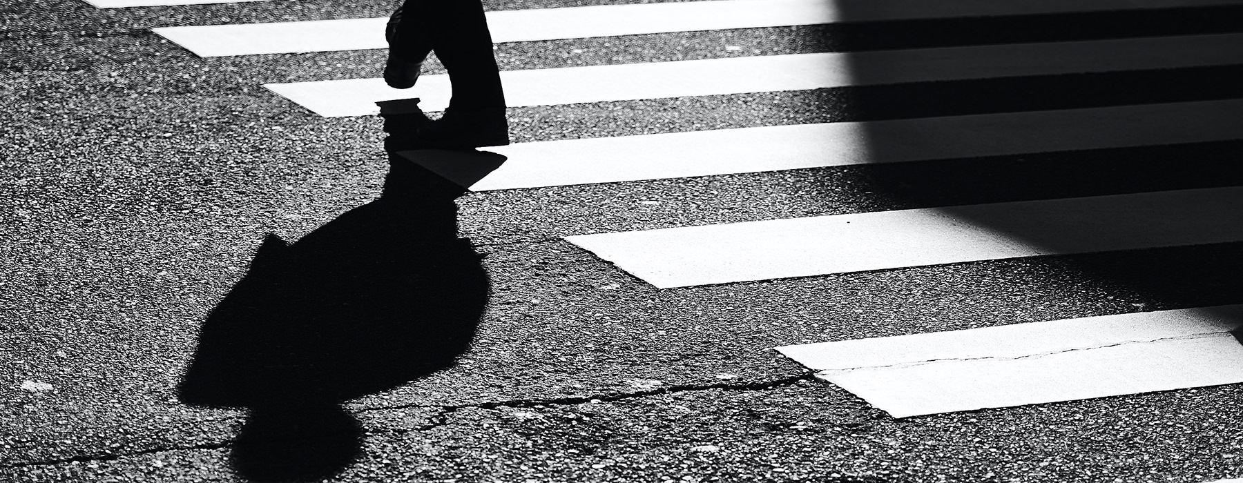 black and white image of crosswalk